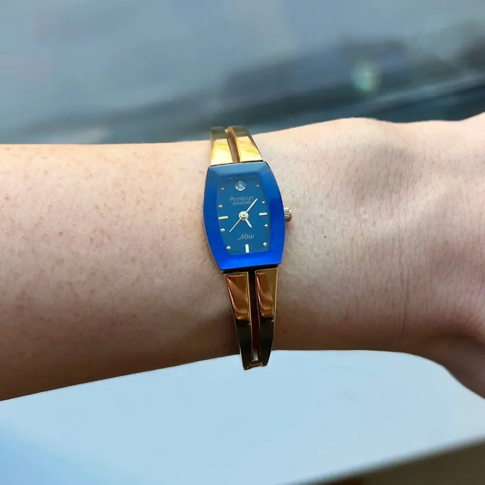 Armitron Diamond Now Blue Dial Gold Tone Bangle Watch